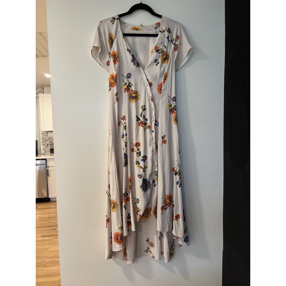 Free People floral midi dress SIZE MEDIUM in a soft cream/ivory base